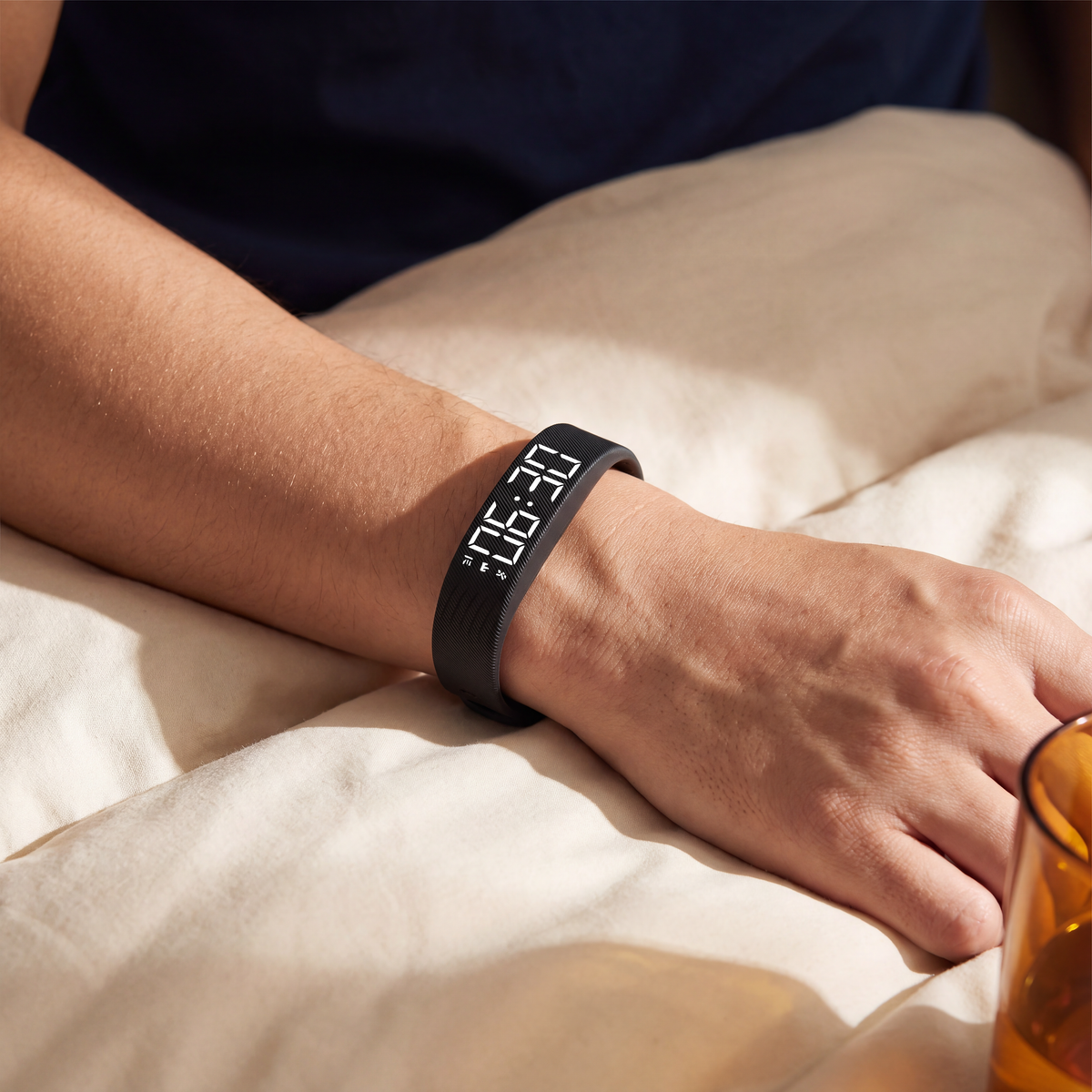 Sotto band worn on the wrist while lying in bed